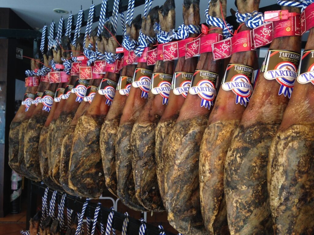 Iberian hams displayed in nearby Jabugo